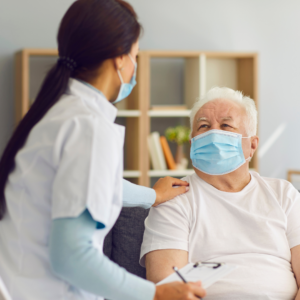 Nurse with elderly man